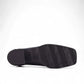 Ros Hommerson Esther black stretch suede shoe with a squared toe and low block heel.
photo of the bottom side