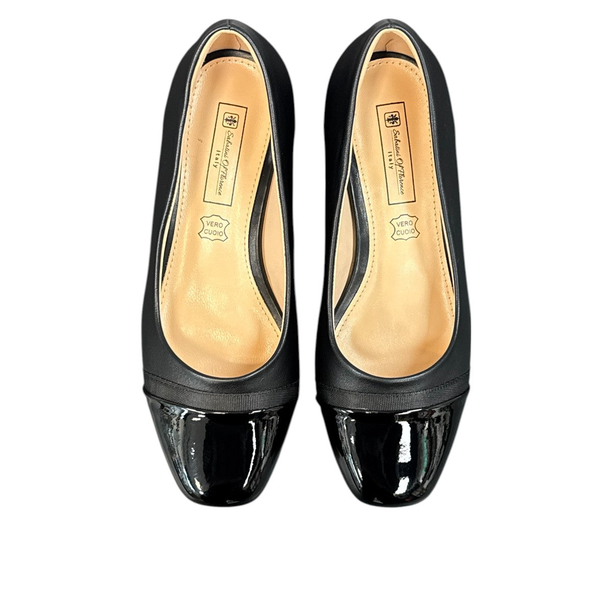 Sabatini of Florence SF1 black slip-on shoe with a glossy cap-toe and low block heel.
photo of the top side