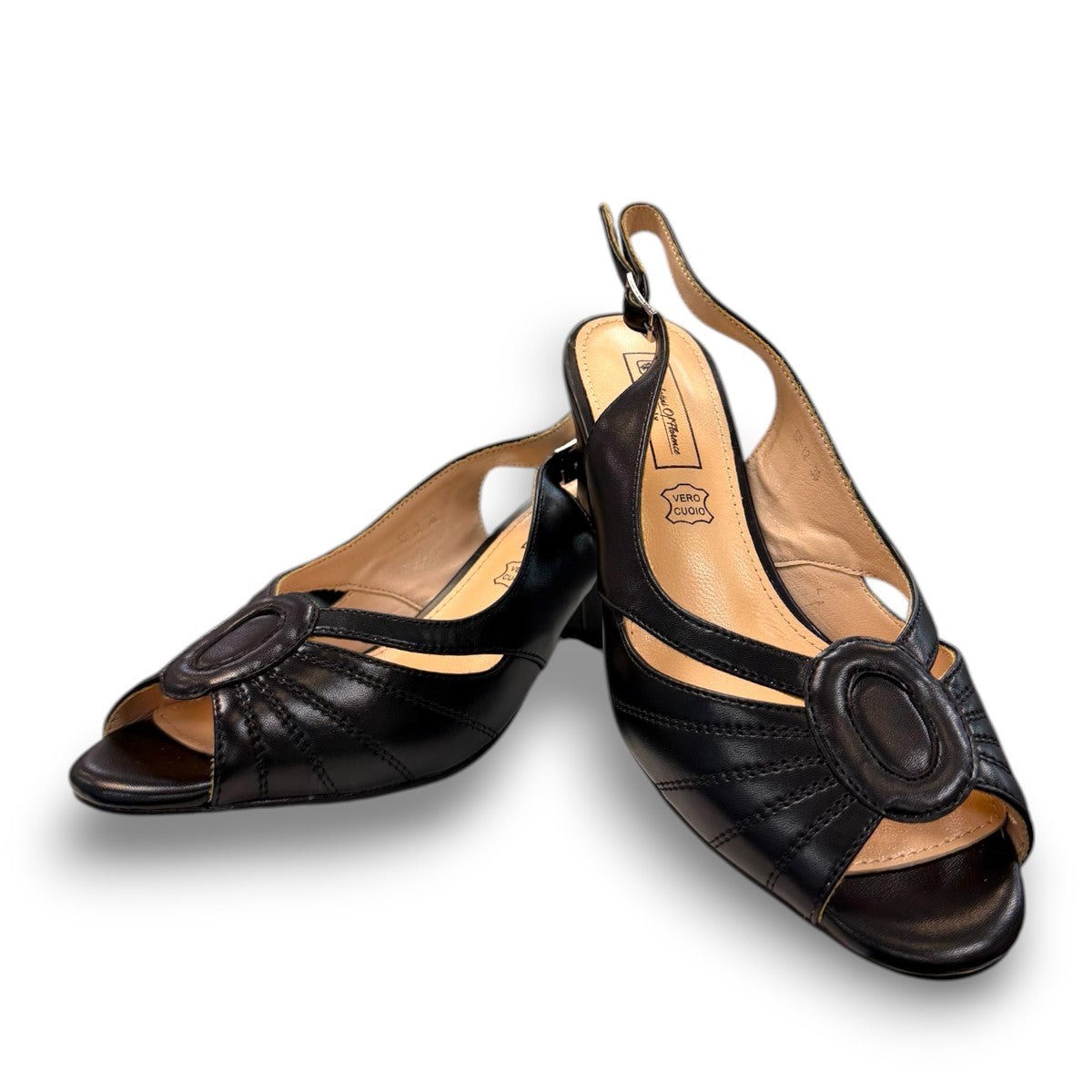 Sabatini of Florence SF12 black leather slingback heel with peep toe and stitched detailing.
photo of the front side