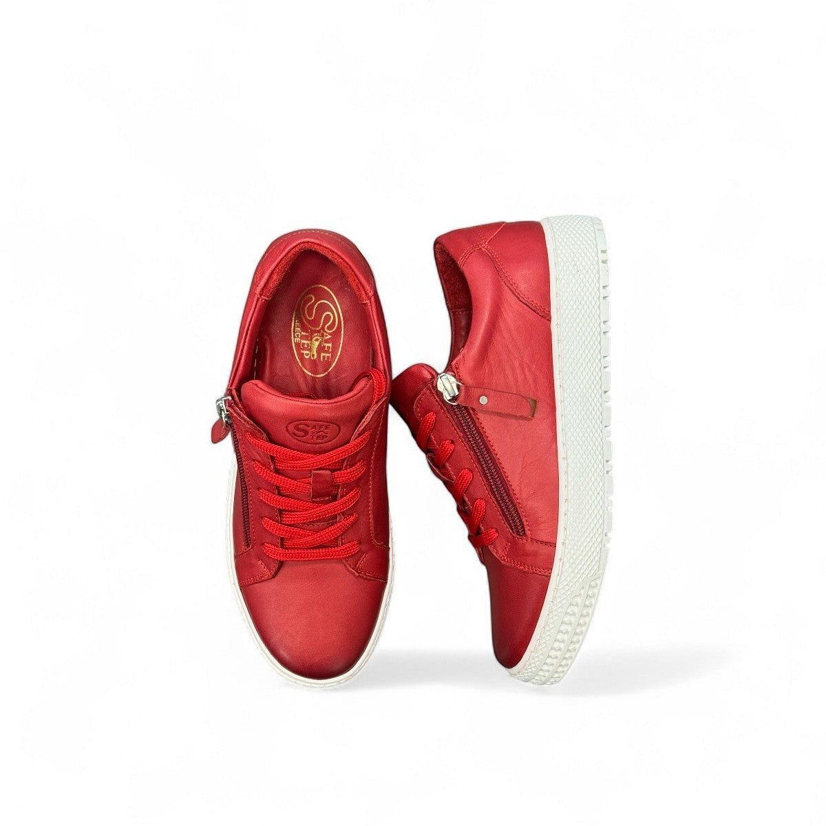 safe step 25491 red leather women's sneaker with side zipper, elastic laces, and a textured white synthetic sole.