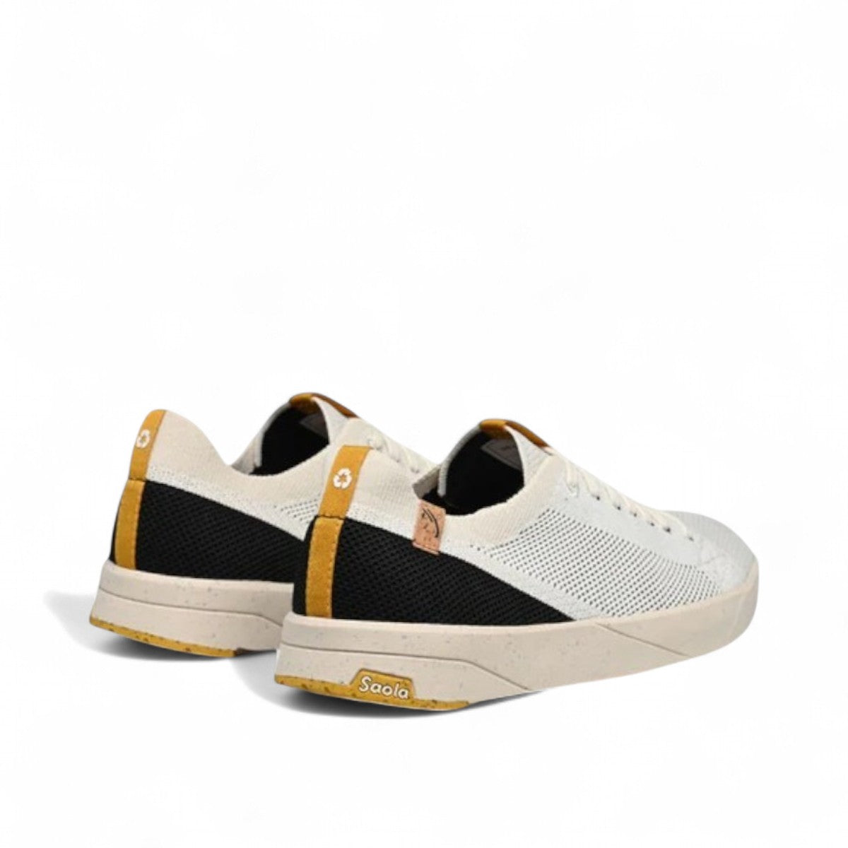 SAOLA Cannon Knit 2.0 sneaker in white and black with a sustainable recycled knit upper and cork details. Photo of back side views.