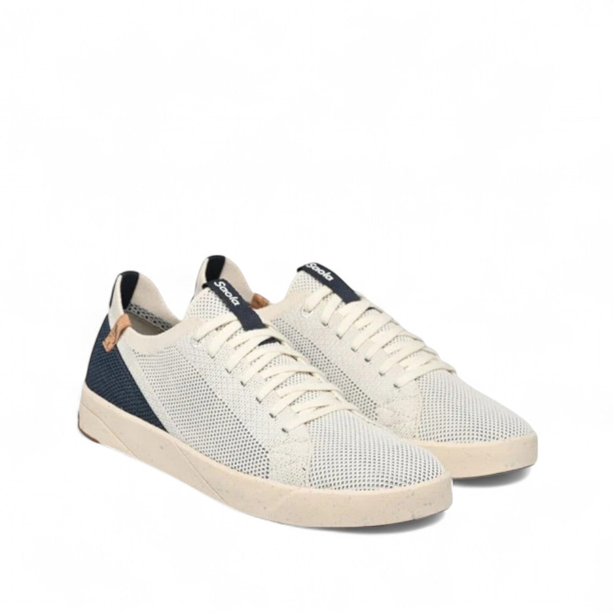 SAOLA Cannon Knit 2.0 sneakers in white and navy with a sustainable recycled knit upper and cork detail. Photo of side views.
