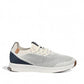 SAOLA Tsavo 2.0M sneaker in white and navy with a breathable knit upper and cork detail. Photo of right side view.