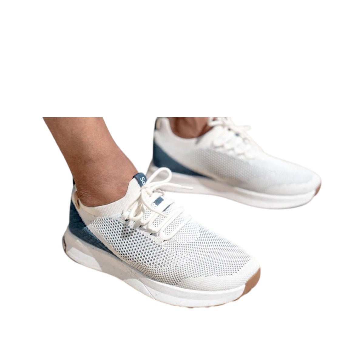 SAOLA Tsavo 2.0M sneaker in white and navy with a breathable knit upper and cork detail. Photo of upper view.