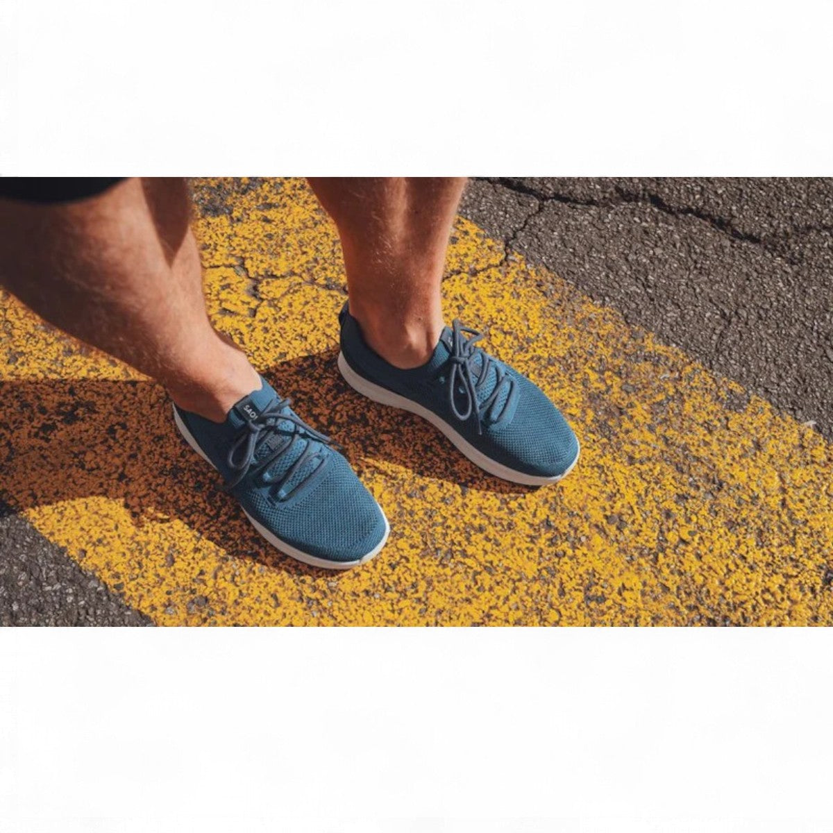 SAOLA TSAVO 3M blue waterproof knit sneaker with a white midsole and flexible slip-on design. Photo of upper view.