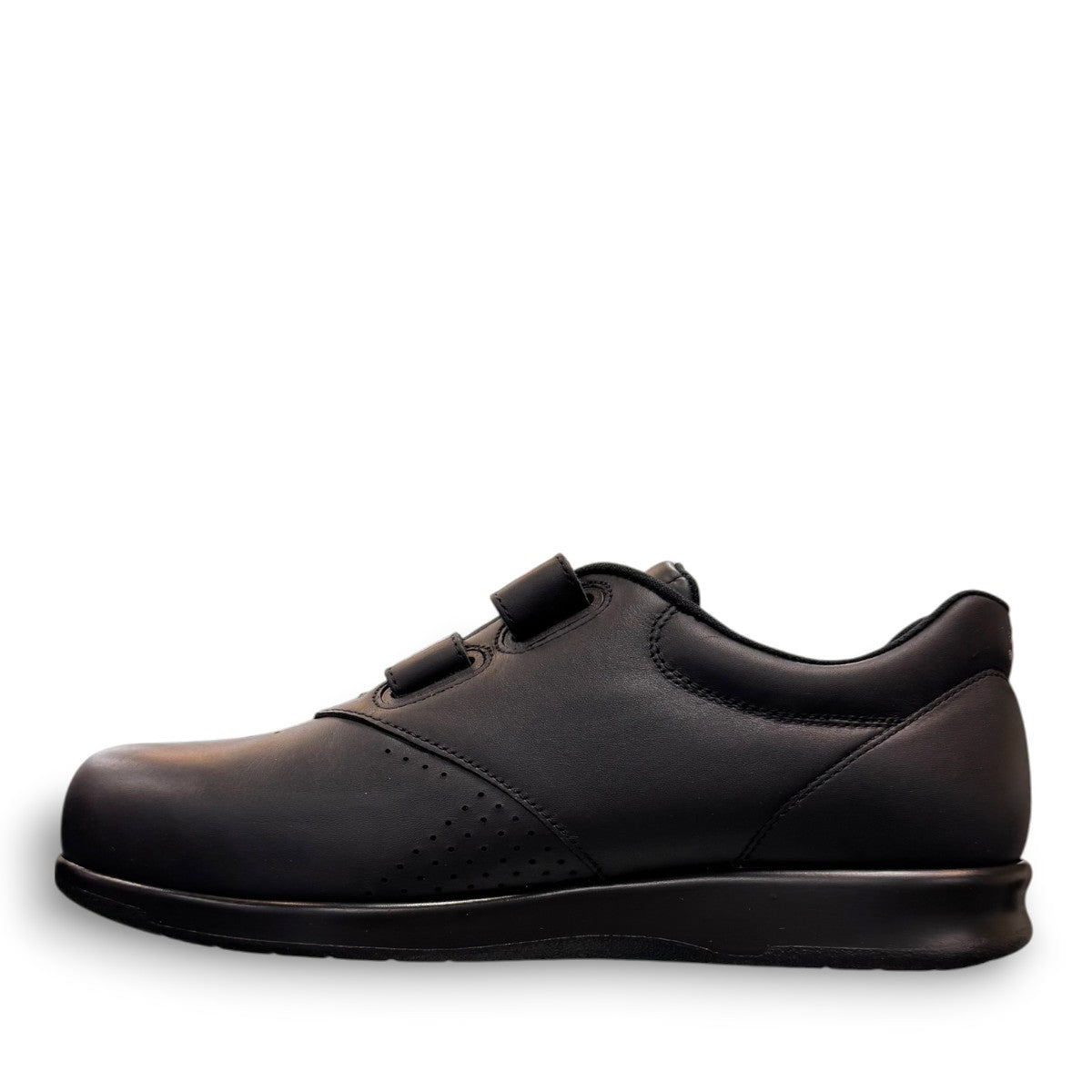 SAS Me Too black leather athletic walking shoe with adjustable EZ Straps and shock-absorbing sole.
photo of the left side