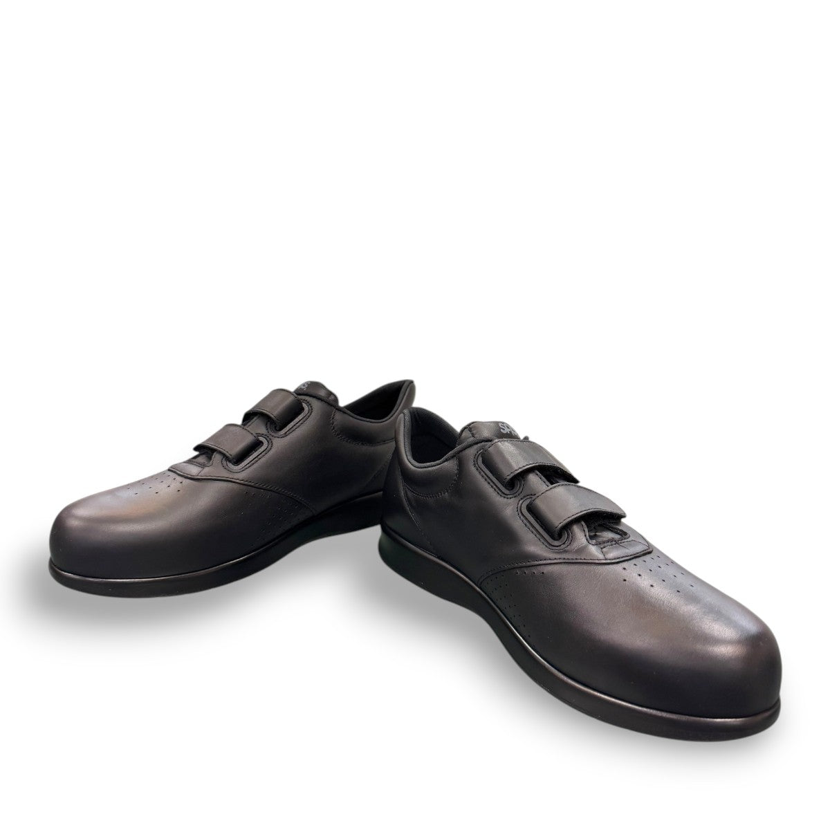 SAS Me Too black leather athletic walking shoe with adjustable EZ Straps and shock-absorbing sole.
photo of the front side