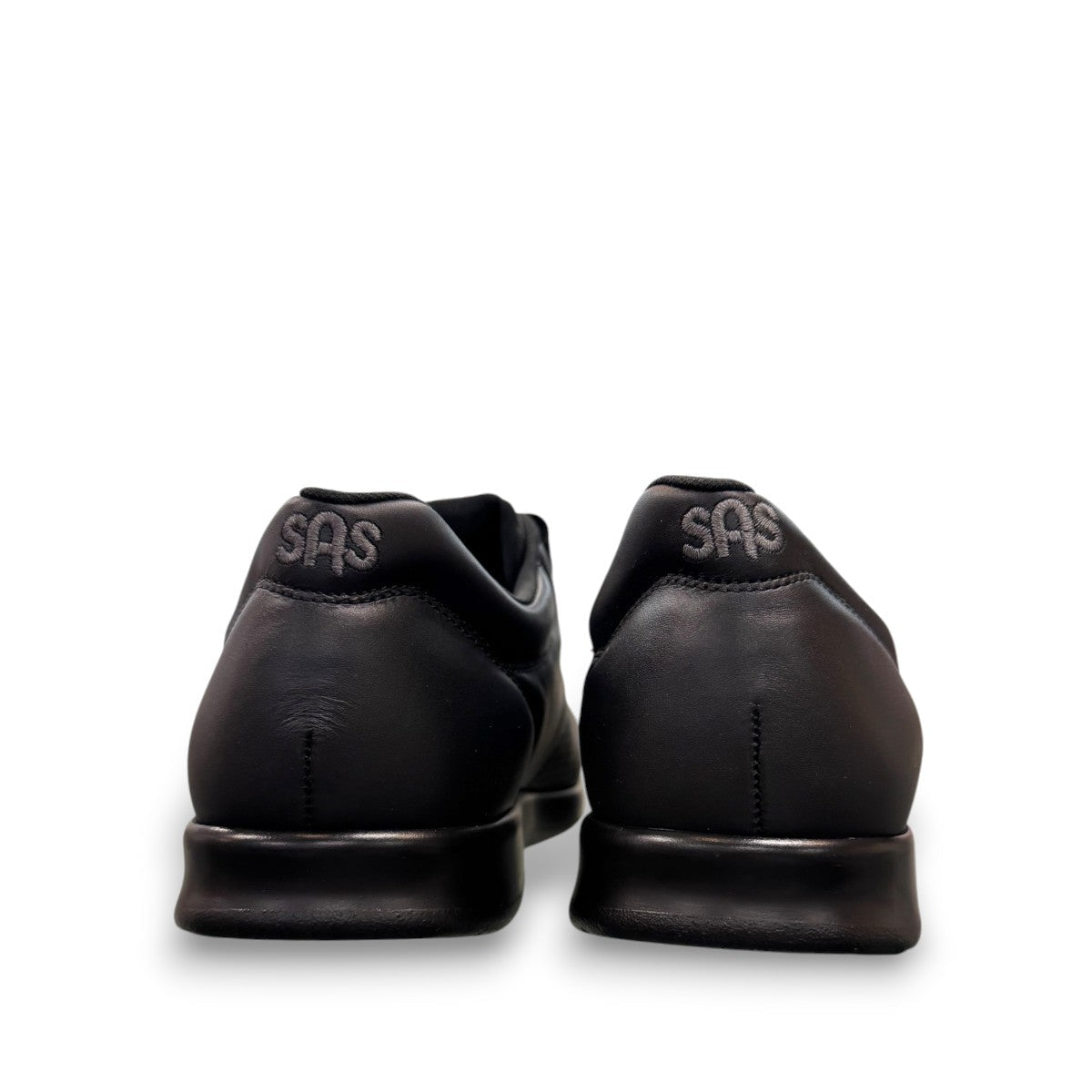 SAS Me Too black leather athletic walking shoe with adjustable EZ Straps and shock-absorbing sole.
photo of the back side