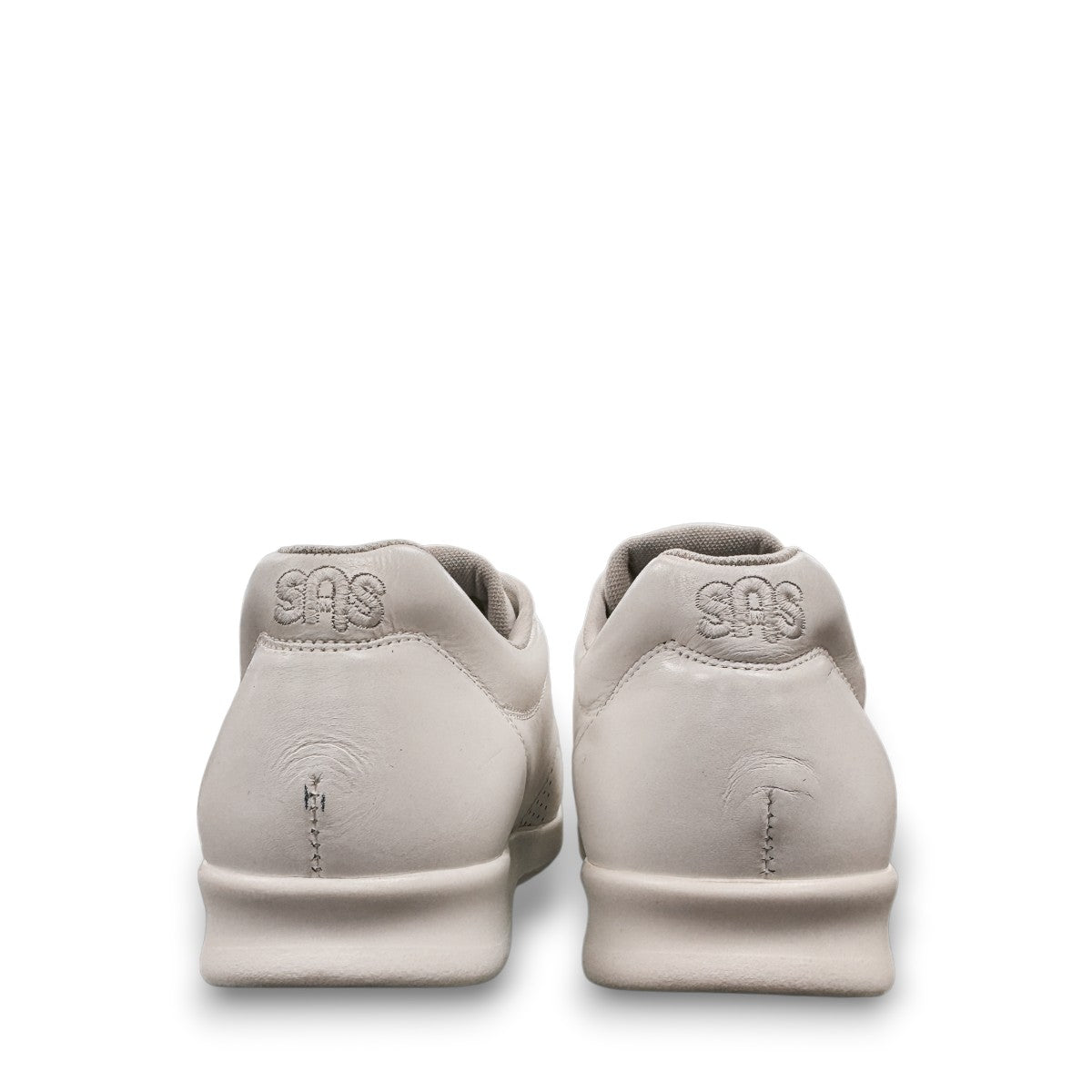 SAS Me Too white leather athletic walking shoe with adjustable EZ straps and cushioned sole.
photo of the back side