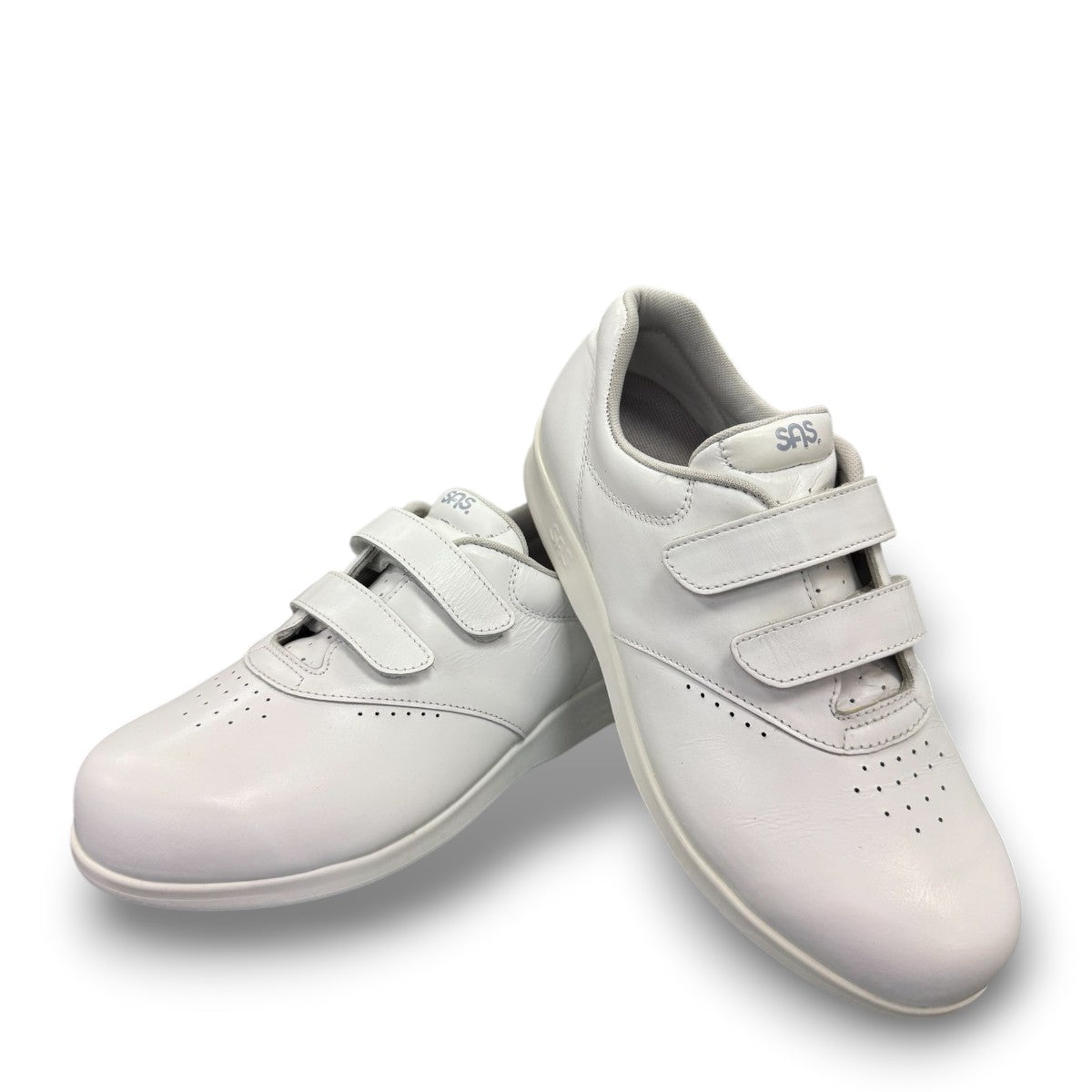 SAS Me Too white leather athletic walking shoe with adjustable EZ straps and cushioned sole.
photo of the front side