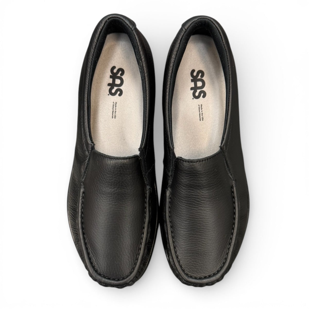 SAS Twin black leather slip-on moccasin shoe with elastic side panels and cushioned polyurethane outsole.
photo of the top side