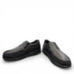 SAS Twin black leather slip-on moccasin shoe with elastic side panels and cushioned polyurethane outsole.
photo of the front side