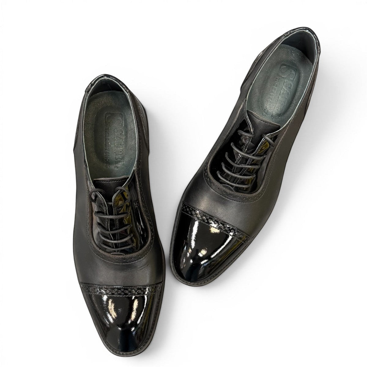 Premium Genuine Leather: Crafted with a genuine leather upper and breathable leather lining for a polished look and lasting comfort.
Comfort & Durability: Features a durable rubber outsole with excellent traction and a lace-up closure for a secure, adjustable fit.
Versatile Style: Finished with subtle handmade stitching for a refined, distinctive look, making it ideal for formal occasions or smart casual wear.