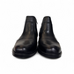 Satel Persia black genuine leather ankle boots with side buckle detail and durable rubber outsole. Photo of front view.