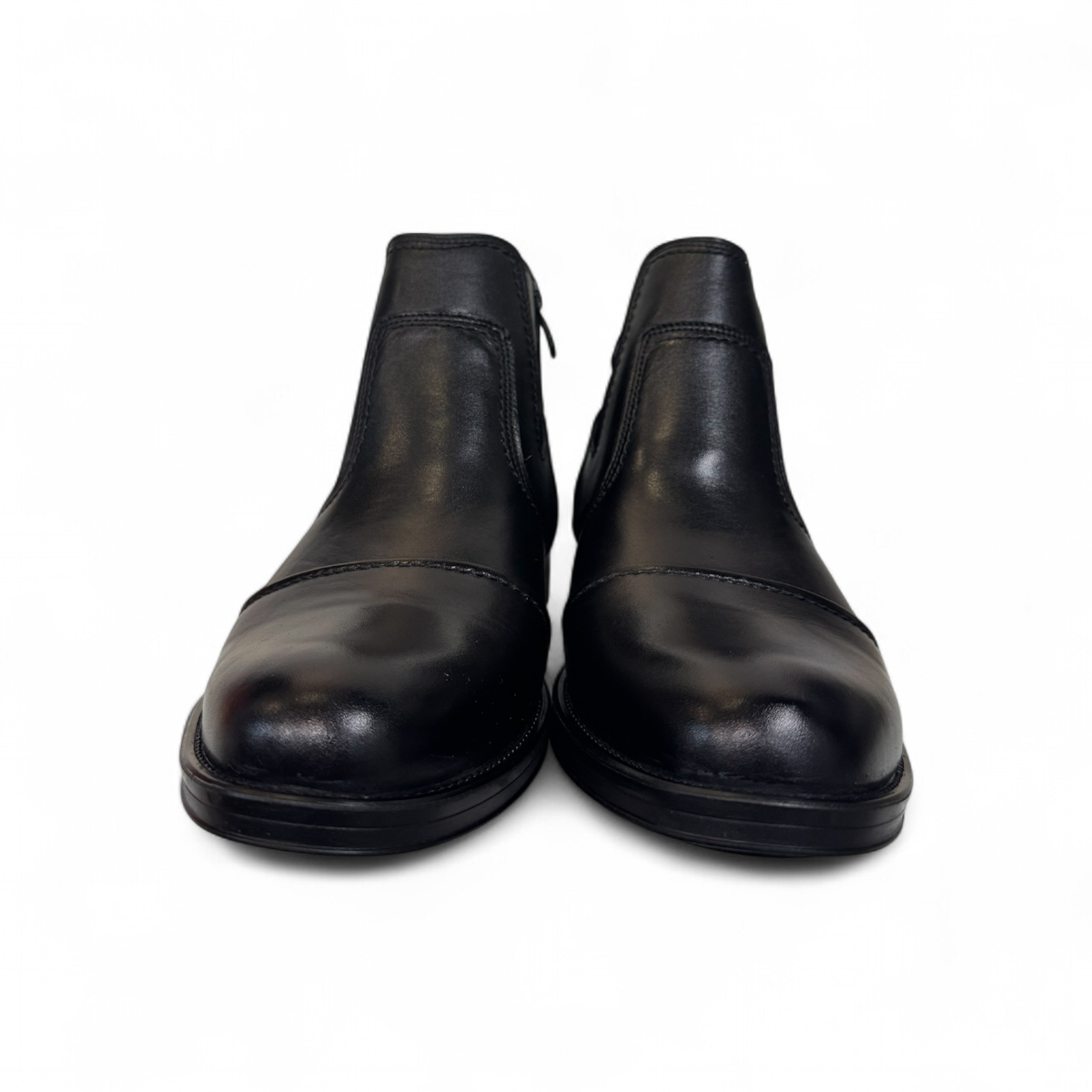Satel Persia black genuine leather ankle boots with side buckle detail and durable rubber outsole. Photo of front view.