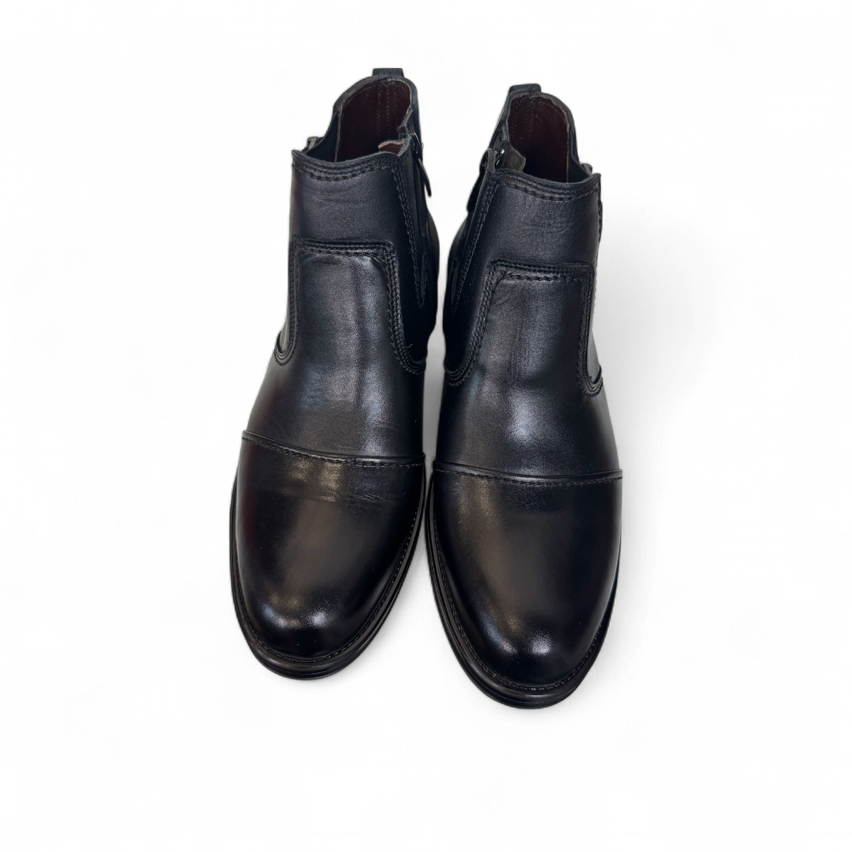 Satel Persia black genuine leather ankle boots with side buckle detail and durable rubber outsole. Photo of upper view.