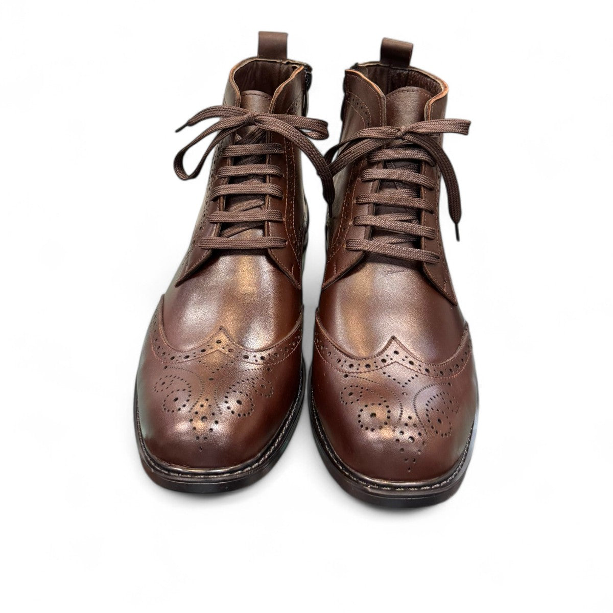 1. Genuine Leather Upper for a Polished finish
2. Leather Lining for Breathability and Comfort
3. Durable Rubber and slip resistant Outsole with Excellent Traction
4. Detailed with Subtle Handmade Stitching for a Refined, distinctive look.