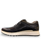 SHAHIN KOOROSH black leather lace-up sneaker with a white rubber sole and refined handmade stitching. Photo of left side view.