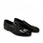 Sina Footwear Verny black patent leather slip-on loafers with a sleek, polished finish for formal occasions. Photo of front side view.