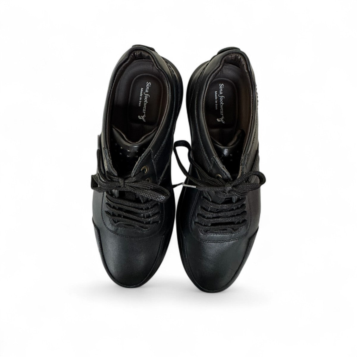 Sina Footwear Alberta black leather lace-up shoes with a durable rubber outsole for smart casual wear. Photo of the soles.