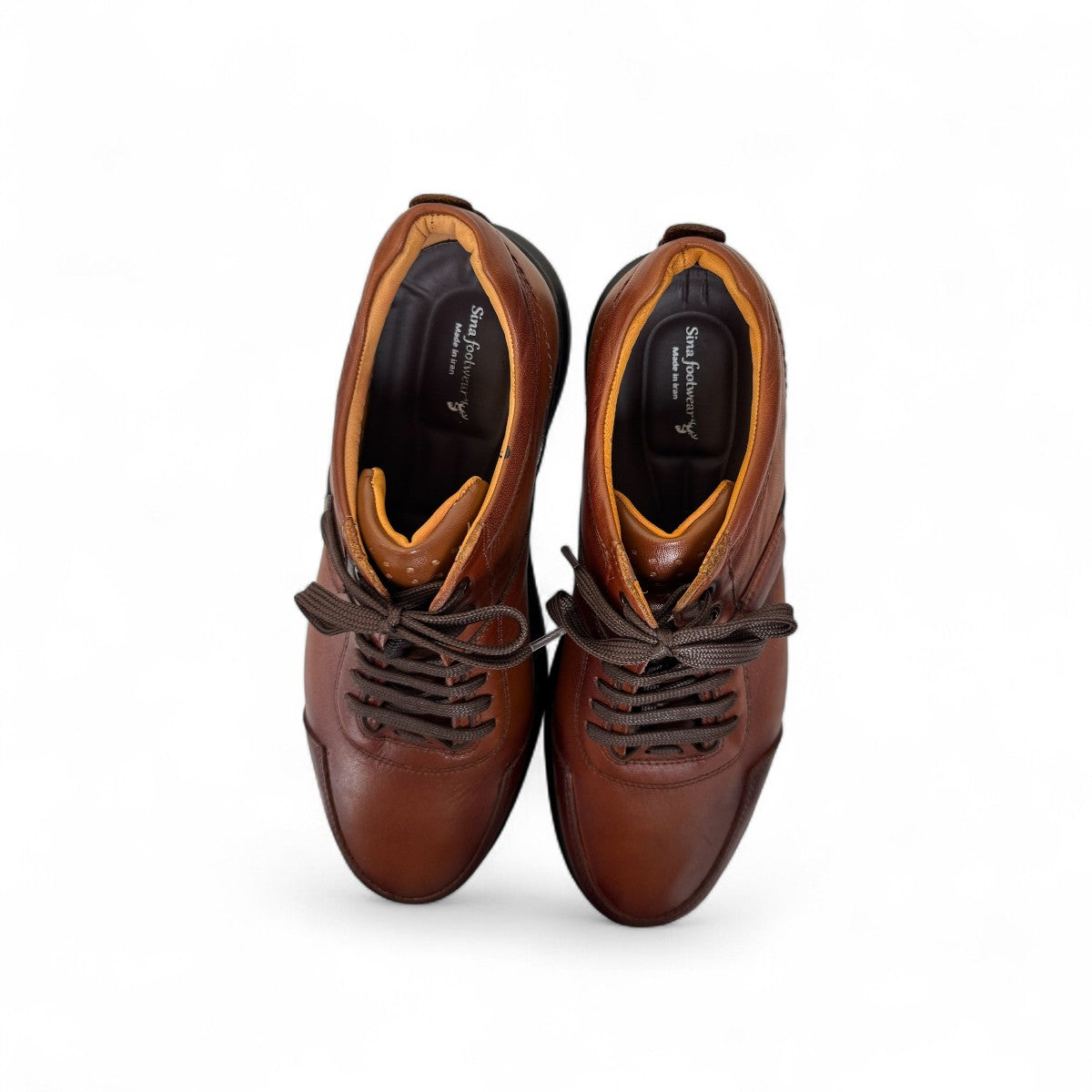 Sina Footwear Alberta brown leather lace-up shoe with a durable black rubber outsole for smart casual wear. Photo of the soles.