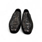 Sina Footwear Aspad black patent leather loafers with a woven texture and refined handmade stitching. Photo of front view.