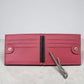 Sina Footwear berry textured leather bifold wallet with money clip and card slots.