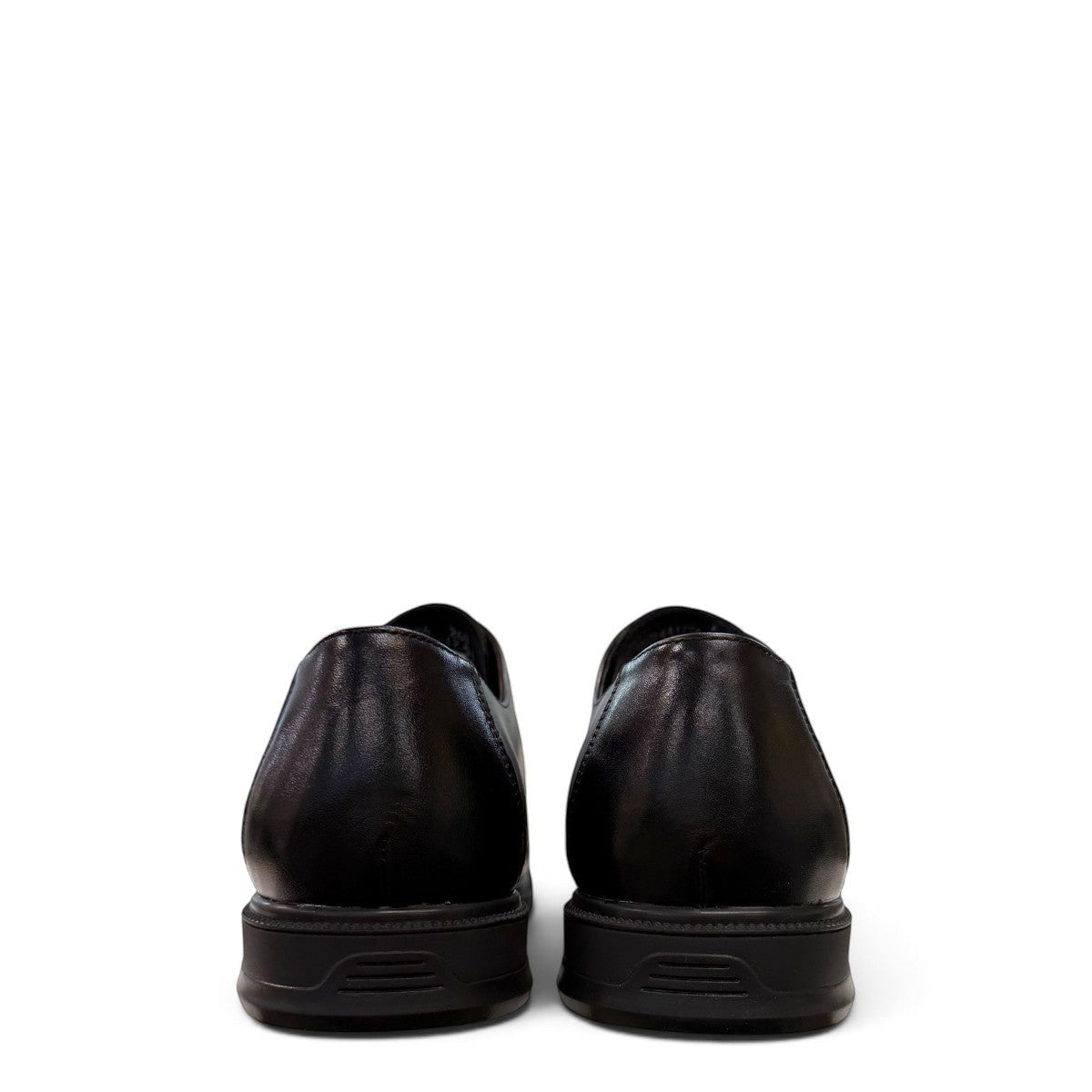Sina Footwear black leather derby shoes with apron-toe construction, lace-up closure, and durable rubber outsole.
photo of the back side