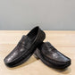 Sina Footwear black genuine leather loafer with embossed geometric pattern and slip-on design.
 photo of the front side