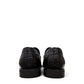 Sina Footwear black genuine leather loafer with a classic silhouette, stitched detailing, and durable rubber outsole.
photo of the back side