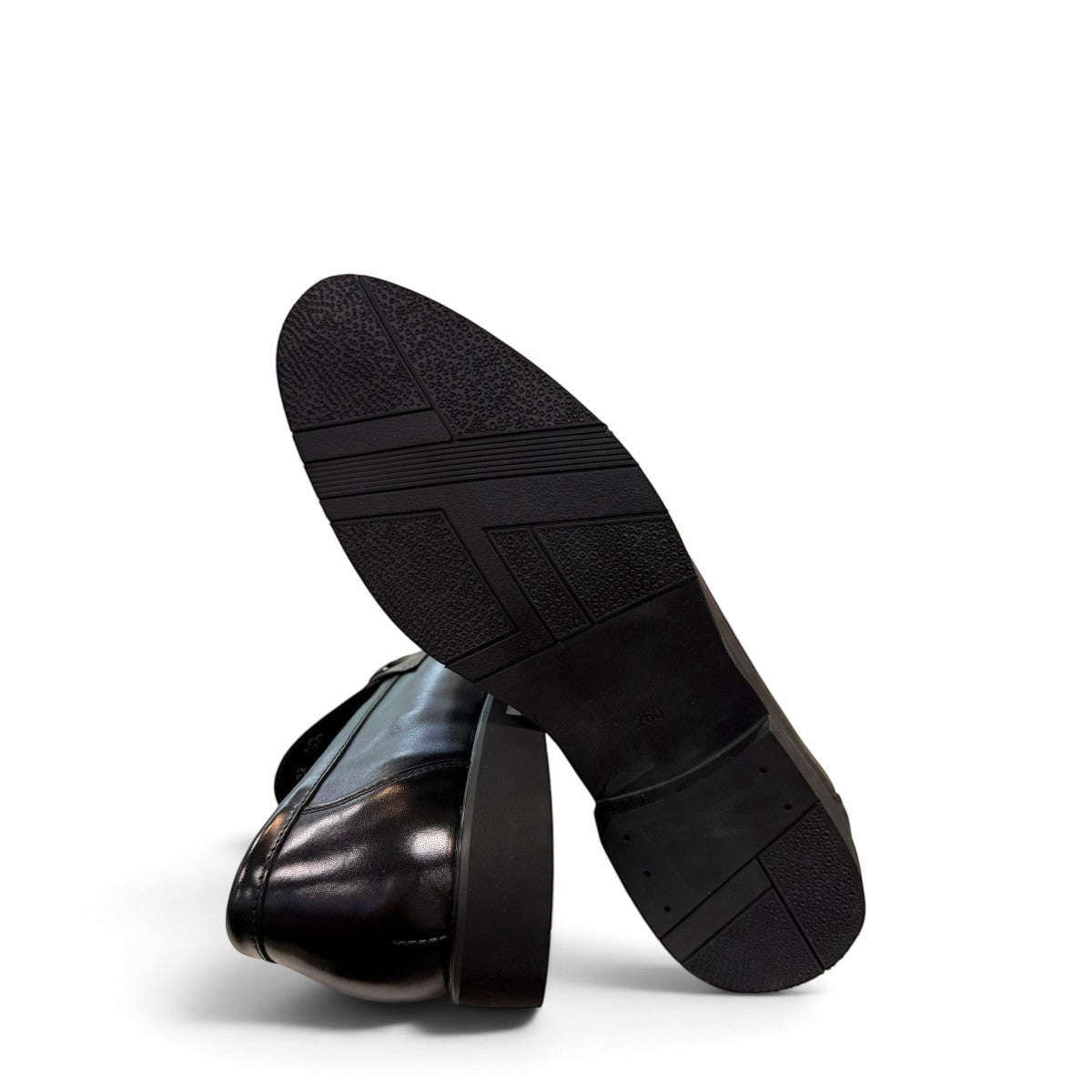 Sina Footwear black genuine leather loafer with a classic silhouette, slip-on design, and durable rubber outsole.
photo of the bottom side