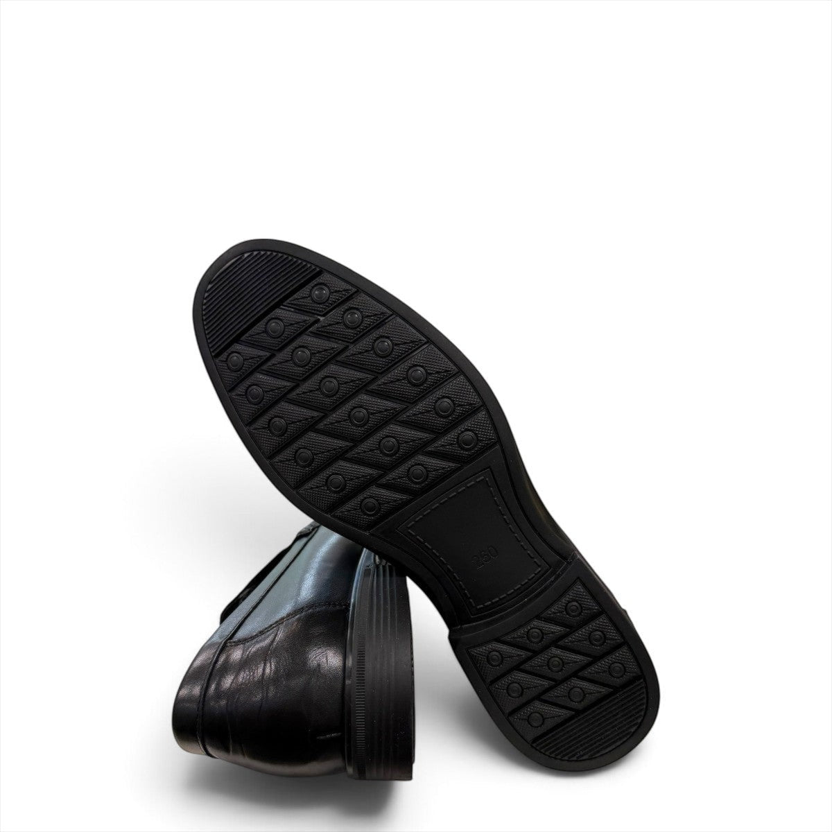 Sina Footwear black genuine leather loafer with a classic silhouette, stitched detailing, and durable rubber outsole.
photo of the bottom side