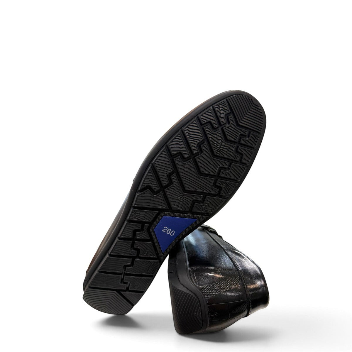 Sina Footwear black genuine leather loafer with a textured vamp strap and durable rubber outsole.
photo of the botom side