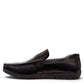 Sina Footwear black genuine leather loafer with a textured vamp strap and durable rubber outsole.
photo of the left side