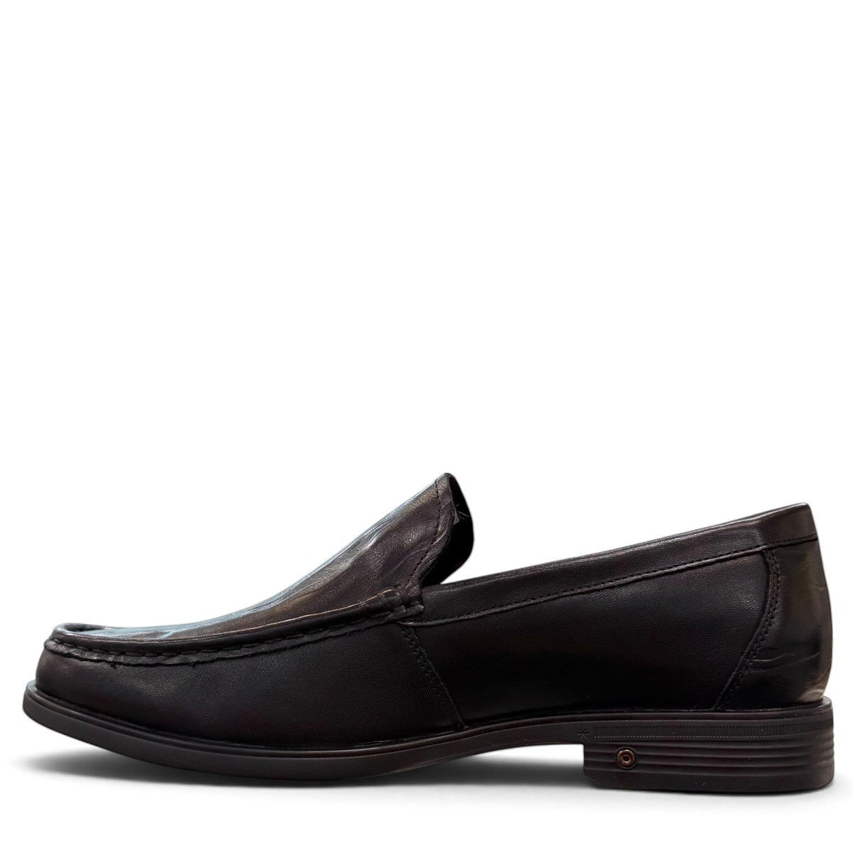 Sina Footwear black genuine leather loafer with a classic silhouette, stitched detailing, and durable rubber outsole.
photo of the left side