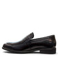Sina Footwear black genuine leather loafer with a classic silhouette, slip-on design, and durable rubber outsole.
photo of the left side
