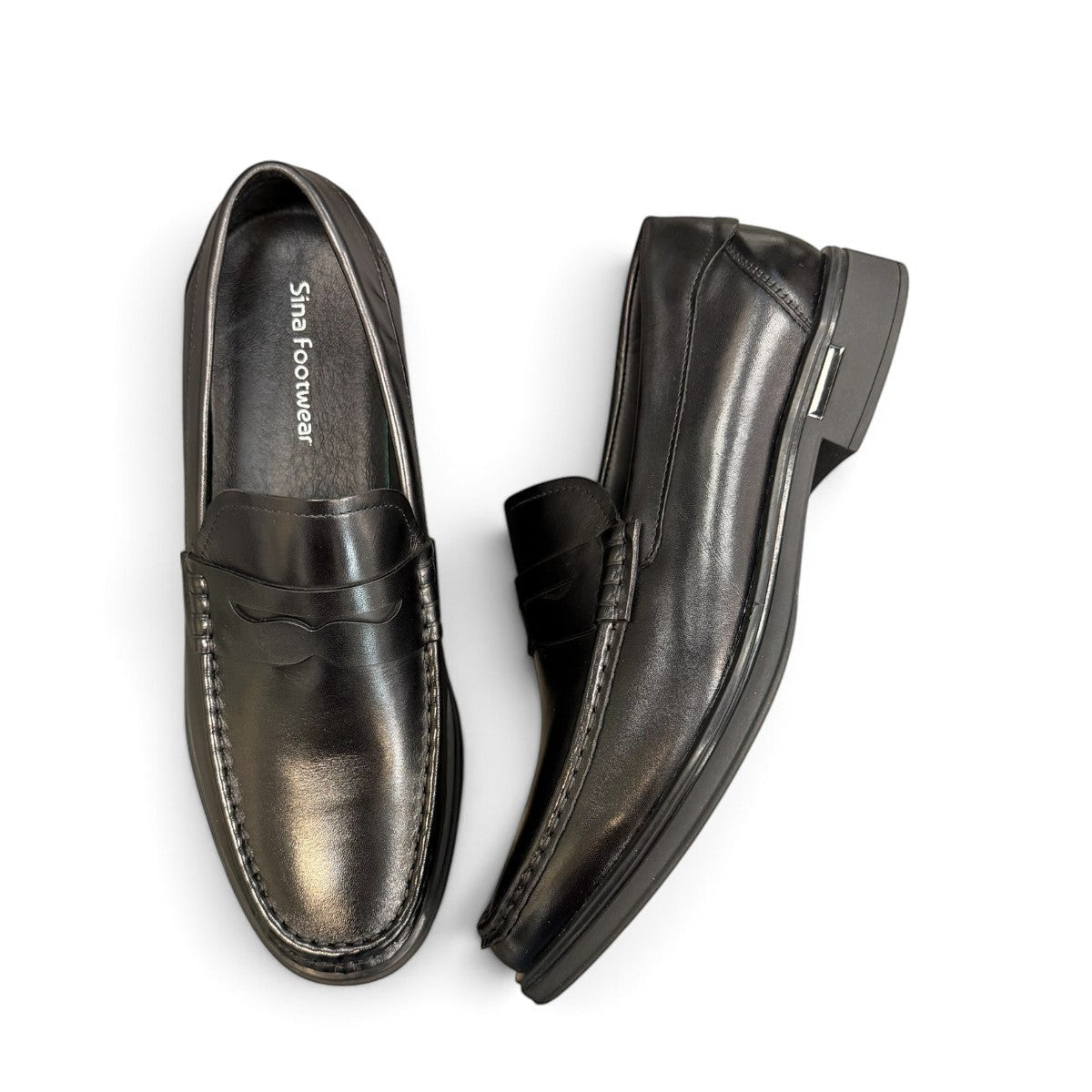 Sina Footwear black genuine leather loafer with a classic slip-on silhouette, cushioned footbed, and rubber outsole.
photo of the top side
