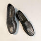 Sina Footwear black genuine leather loafer with a classic silhouette, stitched detailing, and durable rubber outsole.
photo of the top side