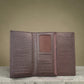 Sina Footwear brown genuine leather tri-fold wallet with multiple card slots and ID window.