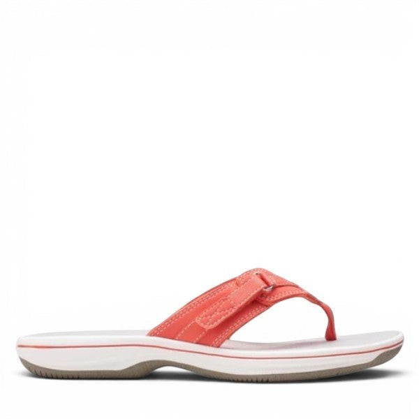 Clarks Breeze Sea bright coral flip-flops with a lightweight sole and adjustable strap closure. photo of the right side.