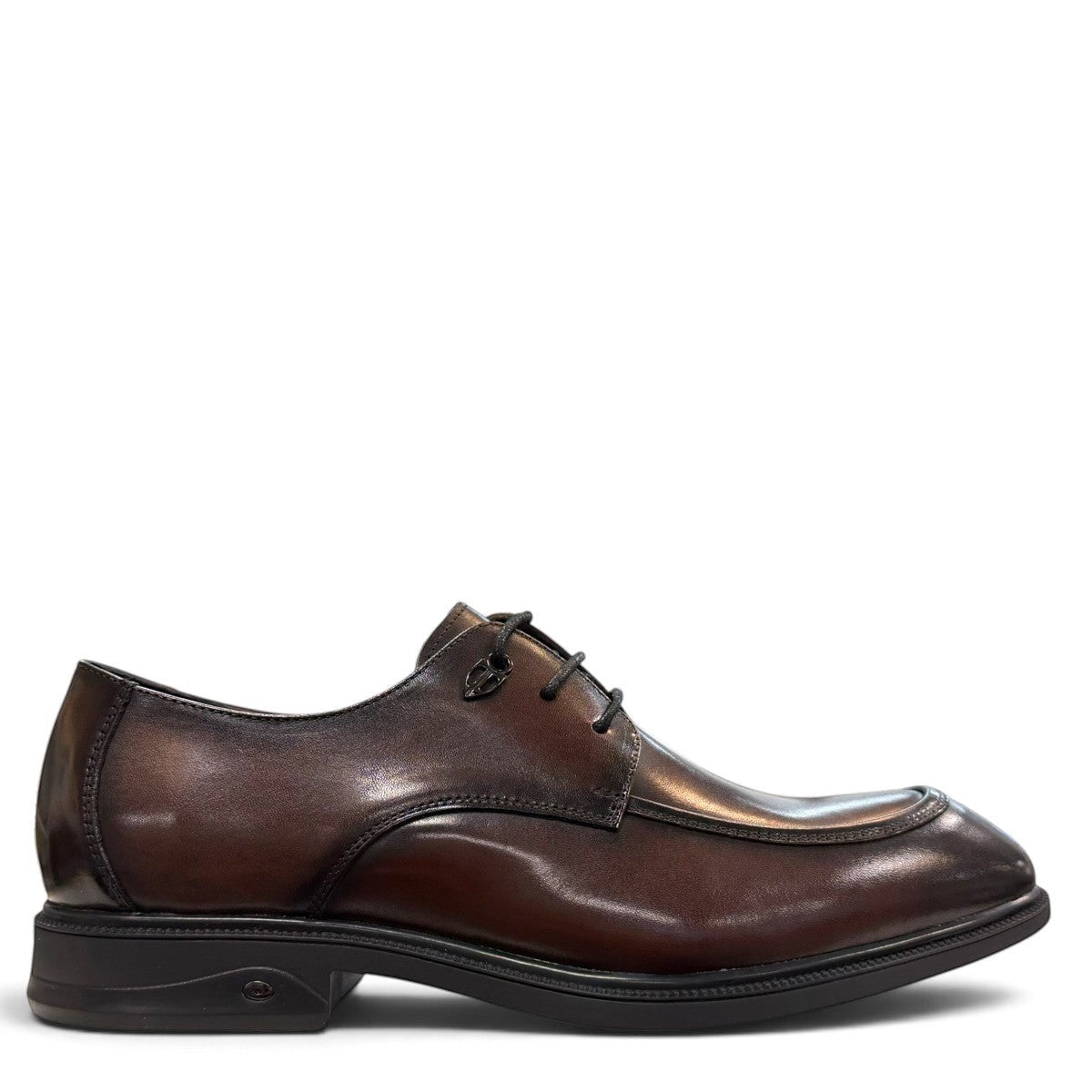 Sina Footwear dark brown leather derby shoe with apron-toe construction and lace-up design on a white background.
photo of the right side