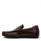 Sina Footwear dark brown genuine leather loafer with crocodile-embossed detail and a durable rubber outsole.
photo of the left side