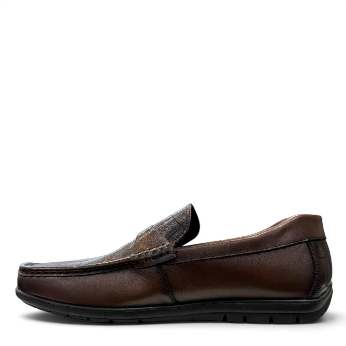 Sina Footwear dark brown genuine leather loafer with crocodile-embossed detail and a durable rubber outsole.
photo of the left side