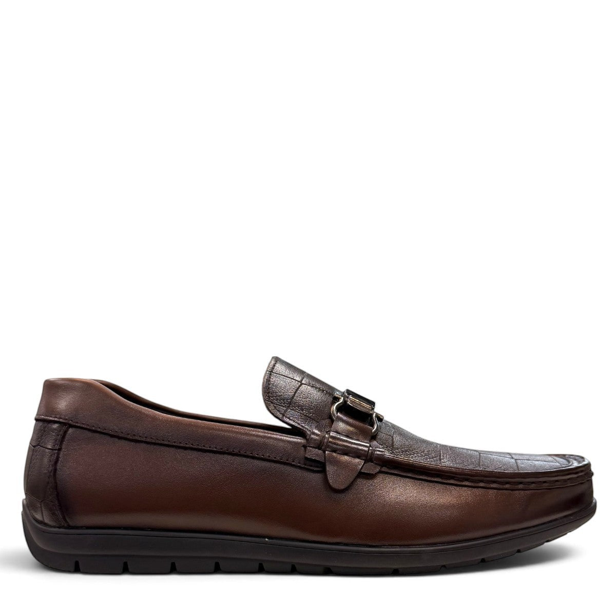 Sina Footwear dark brown genuine leather loafer with crocodile-embossed detail and a durable rubber outsole.
photo of the right side