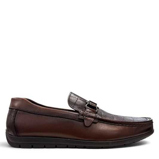Sina Footwear dark brown genuine leather loafer with crocodile-embossed detail and a durable rubber outsole.
photo of the right side