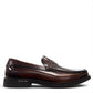 Sina Footwear dark brown genuine leather penny loafer with a classic silhouette and durable rubber outsole.
photo of the right side