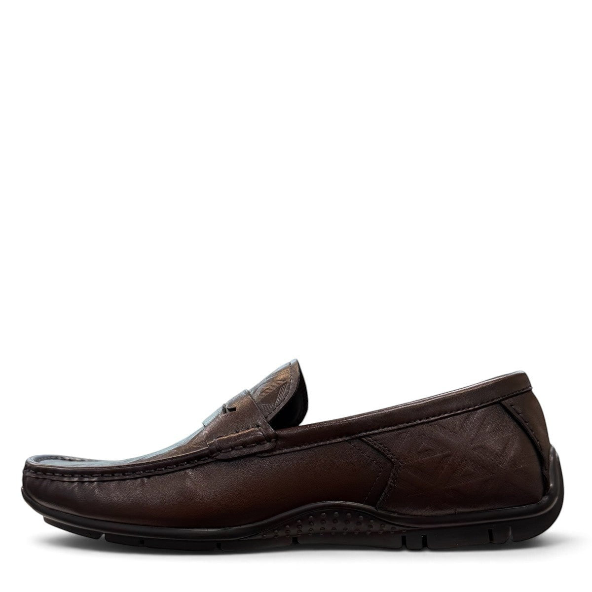 Sina Footwear dark brown genuine leather loafer with embossed geometric pattern and durable rubber outsole.
photo of the left side