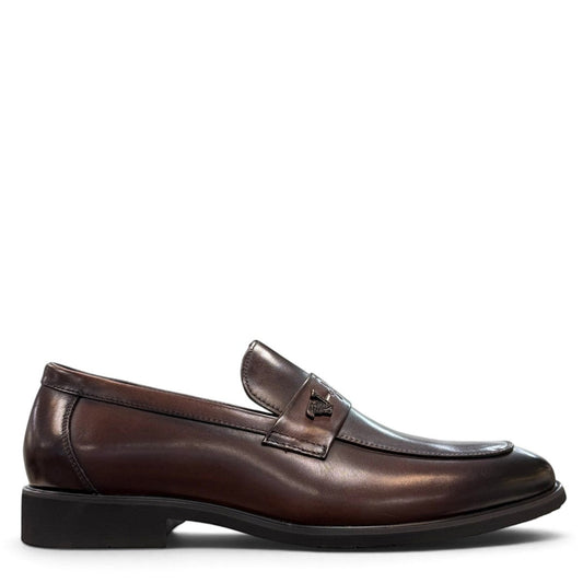 Sina Footwear dark brown genuine leather loafer with a classic silhouette, metal detail, and durable rubber outsole.
photo of the right side