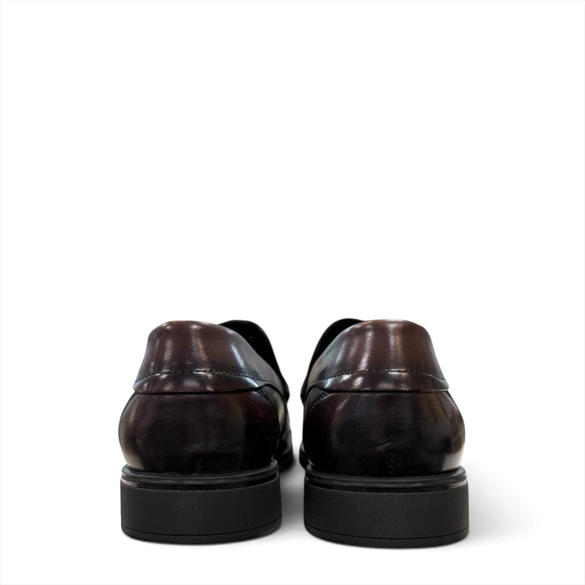 Sina Footwear dark brown genuine leather penny loafer with a classic silhouette and durable rubber outsole.
photo of the  back side
