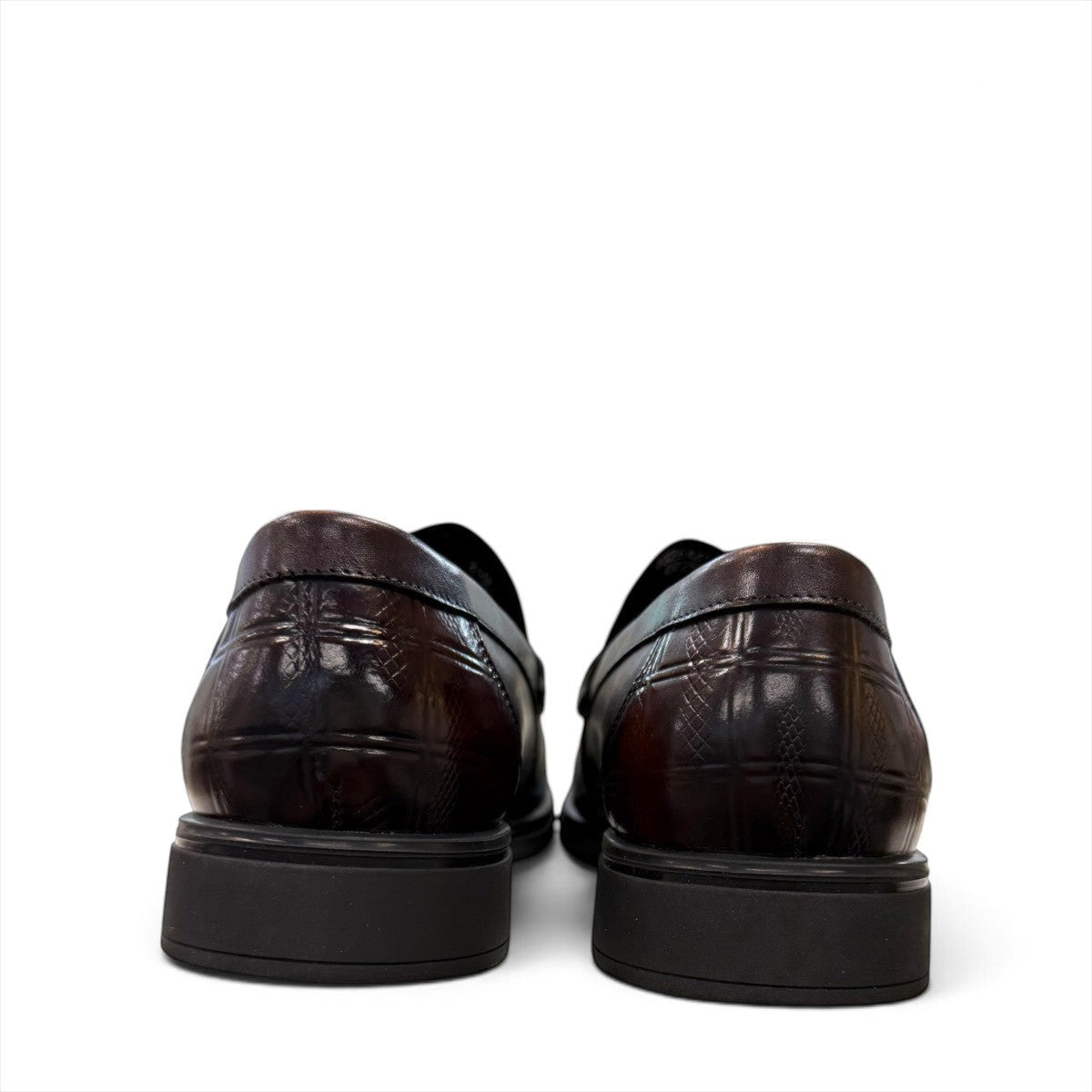 Sina Footwear dark brown genuine leather loafer with a textured croc-effect vamp and metallic buckle detail.
 photo of the back side